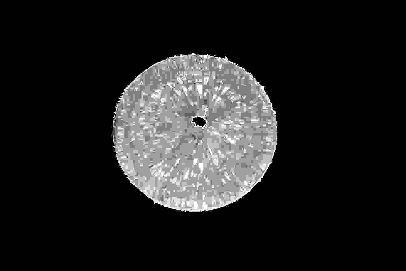 Durchsichtige, runde Disc mit einer strukturierten Oberfläche, die funkelt und Licht reflektiert.