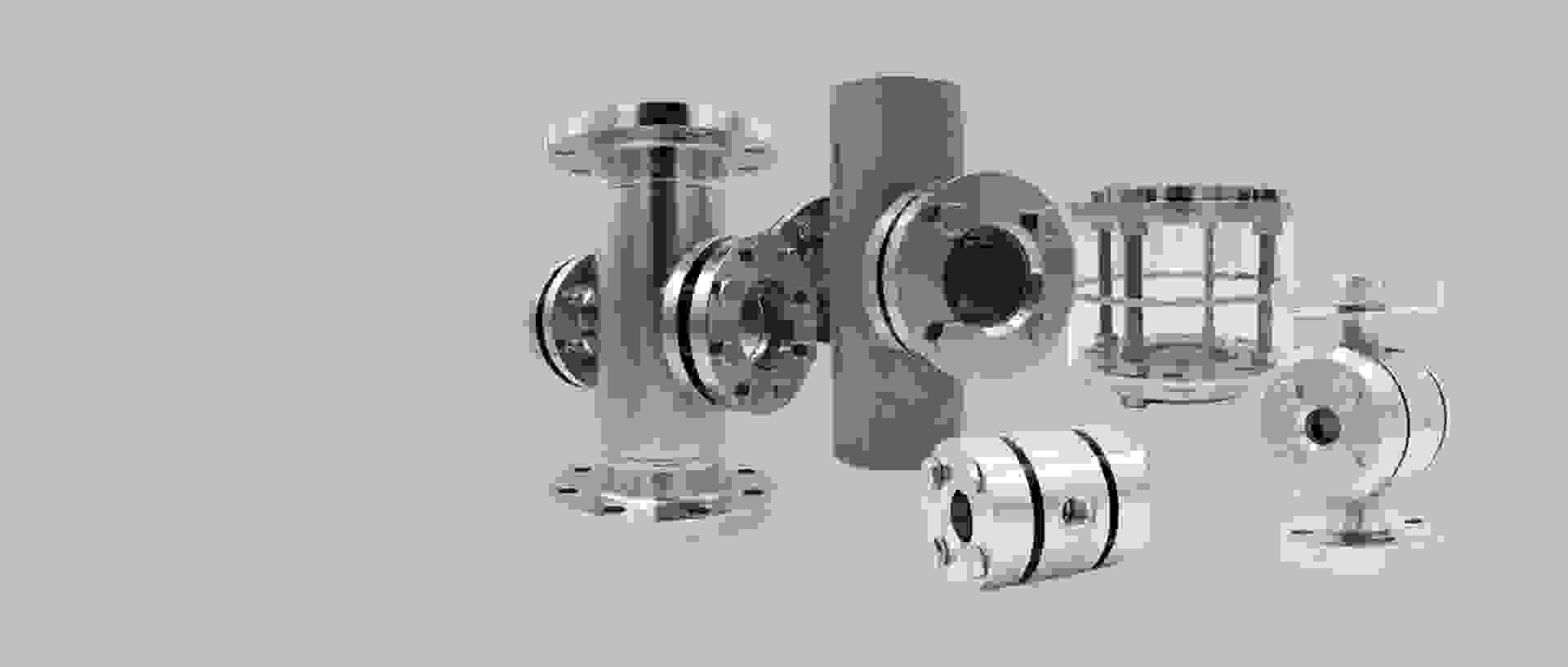 Various industrial stainless steel valves and components on a gray background.