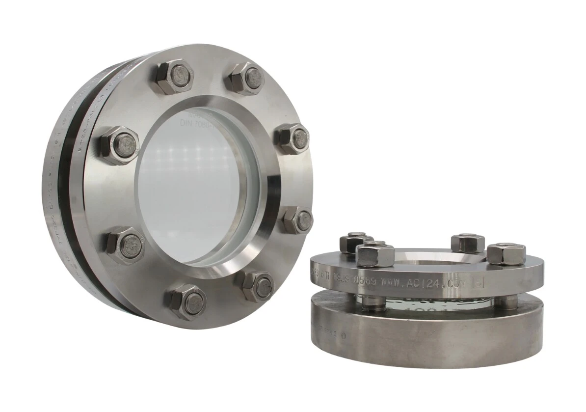 Stainless steel flanges with transparent sight window, for use in pipeline systems.