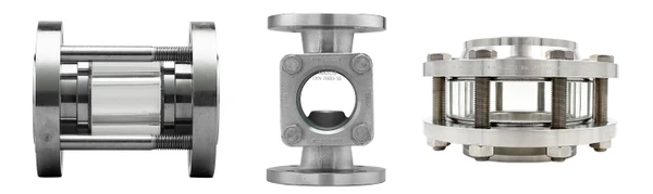 Three different sight tubes made of stainless steel with glass, for monitoring flows in pipelines.