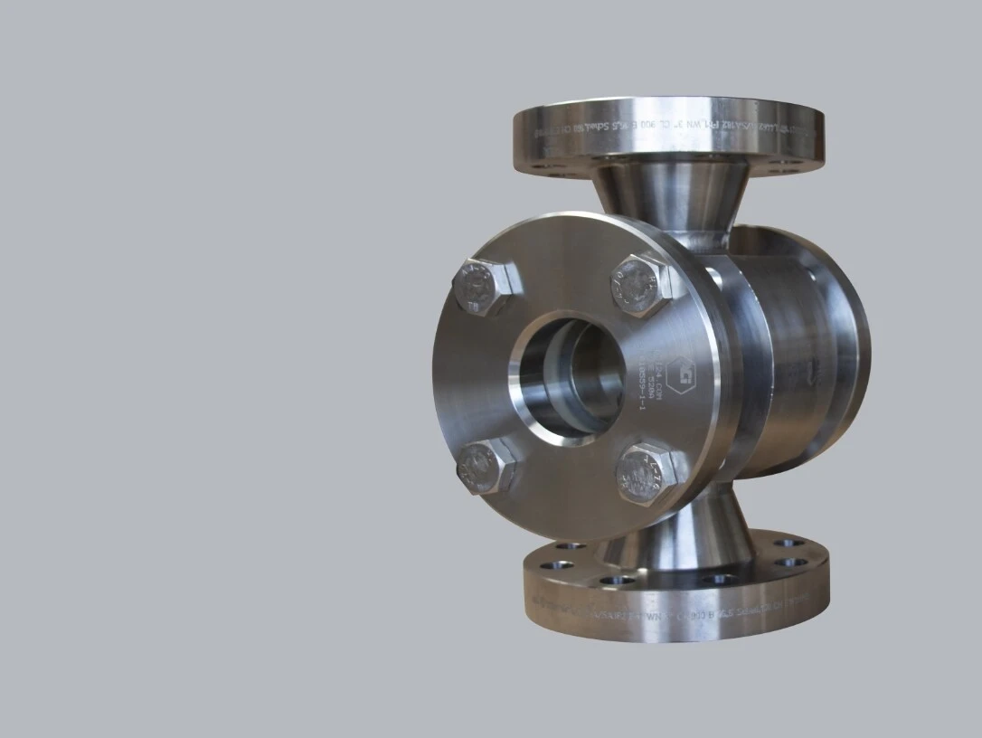 Stainless steel valve with flanges, standing on a gray background.